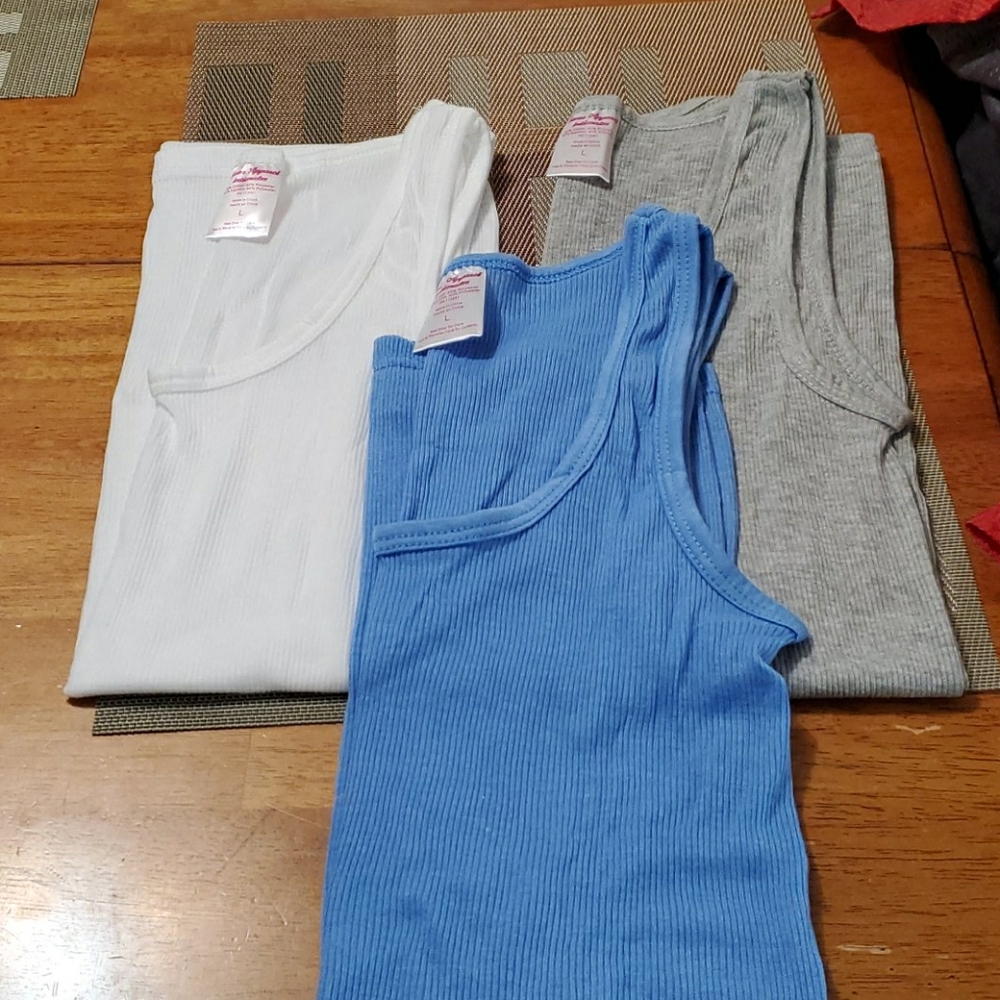 Three large tank tops